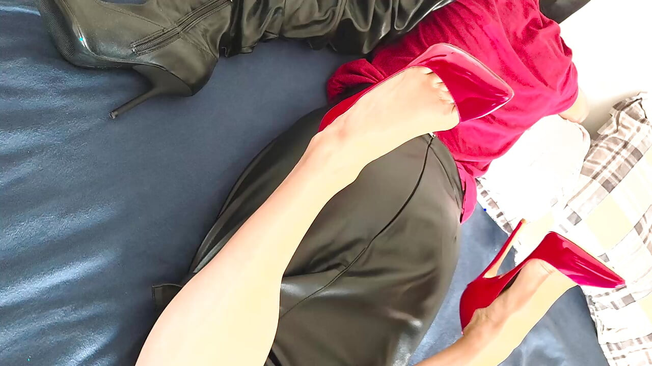 My wife taunts me in red stilettos while wearing long boots over her arms, and calls her bizarre ritual Boot-Cross-Relief, 36.