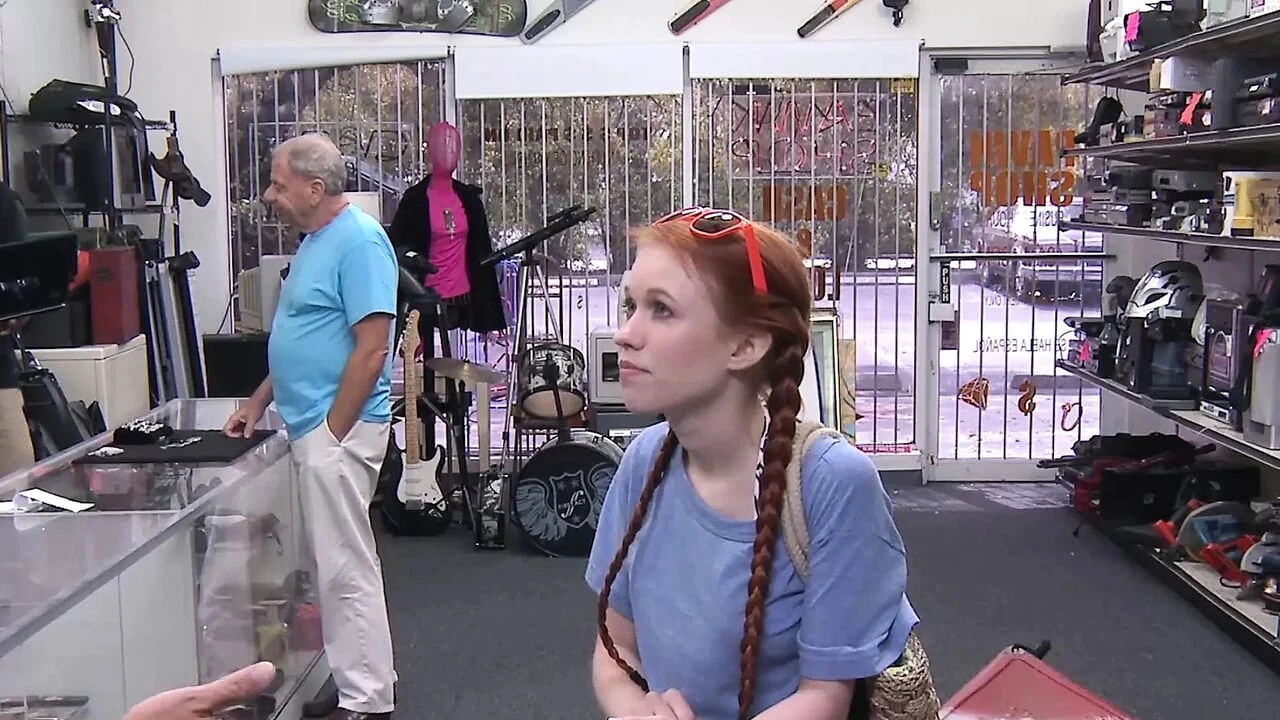 Little redhead temptress earns money by fucking in pawnshop
