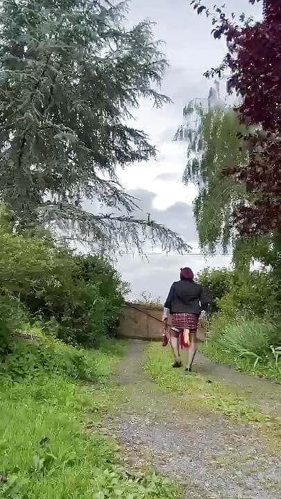 Dressed in a little plaid suspender skirt for an evening