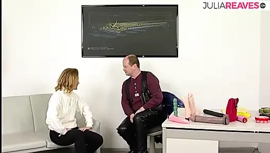 Blonde hottie sucks a huge dildo then rides it on the bed