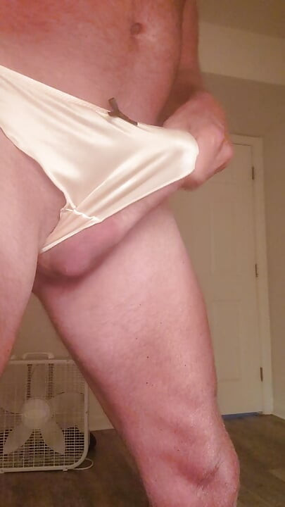 Playing in my satin thongs until I cum.