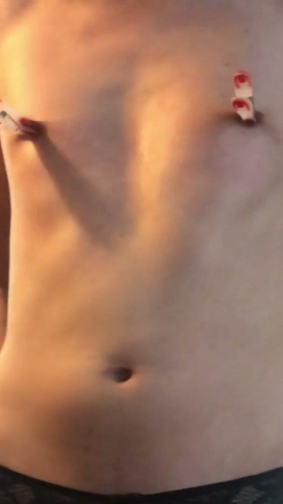 Beautiful sissy gets naked, puts clamps on her nipples, jerks off her big cock with nettles and makes herself cum hard | Clip 1