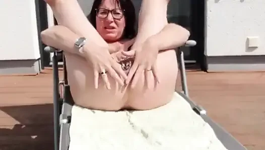 Splashing on the Deck Chair Outside