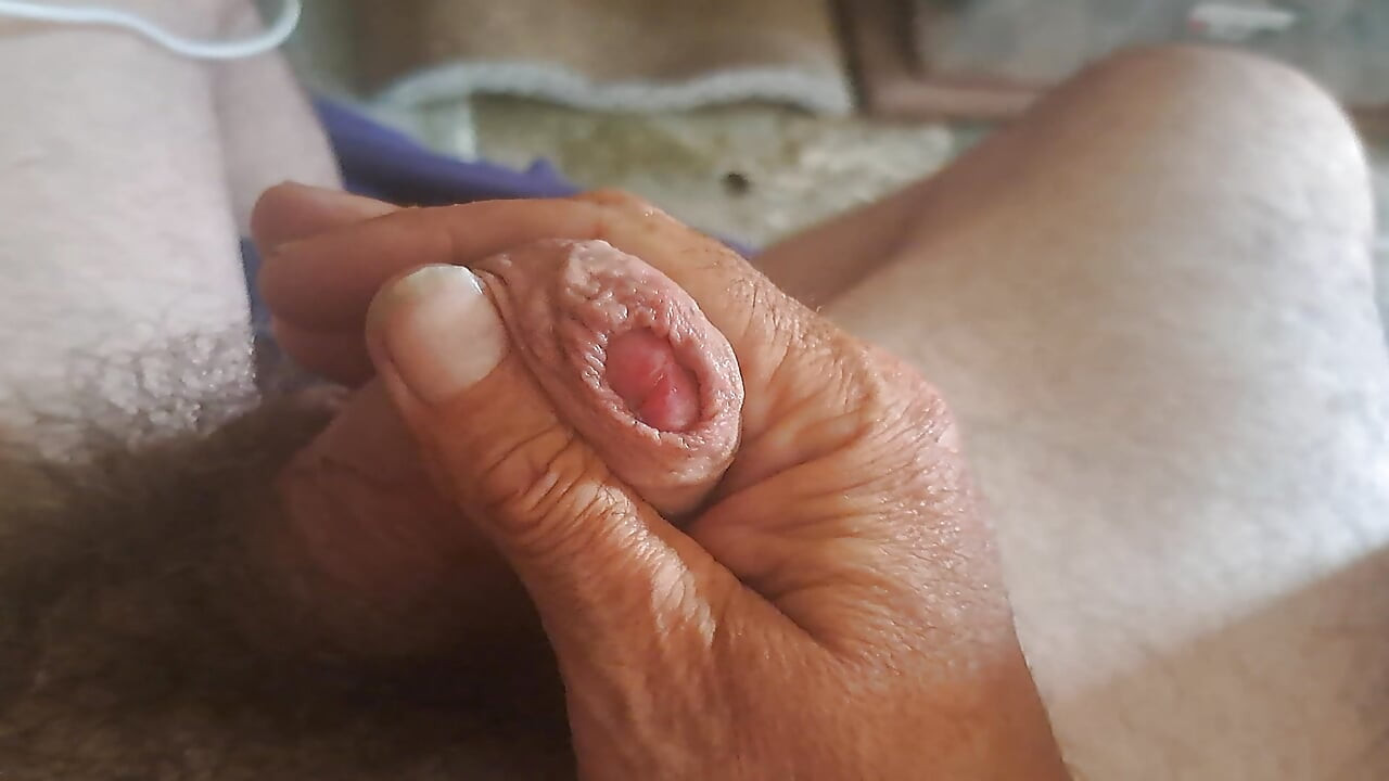 An obese old man having a nice wank