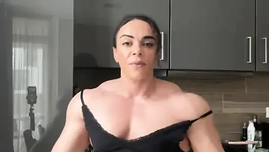 Ebony mom wears dominance like armor over muscular hips