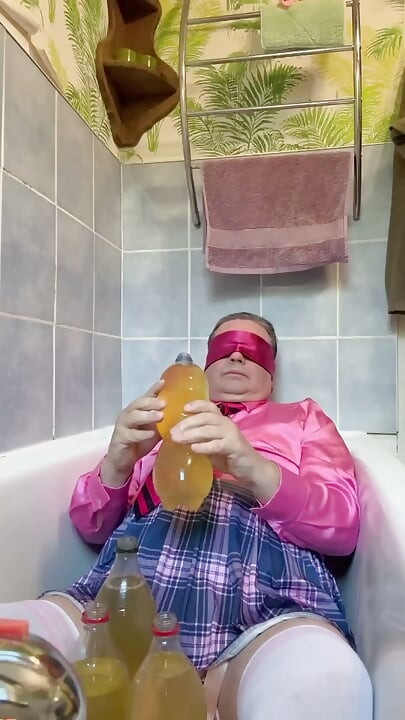 In a schoolgirl outfit to take a piss shower with bottles