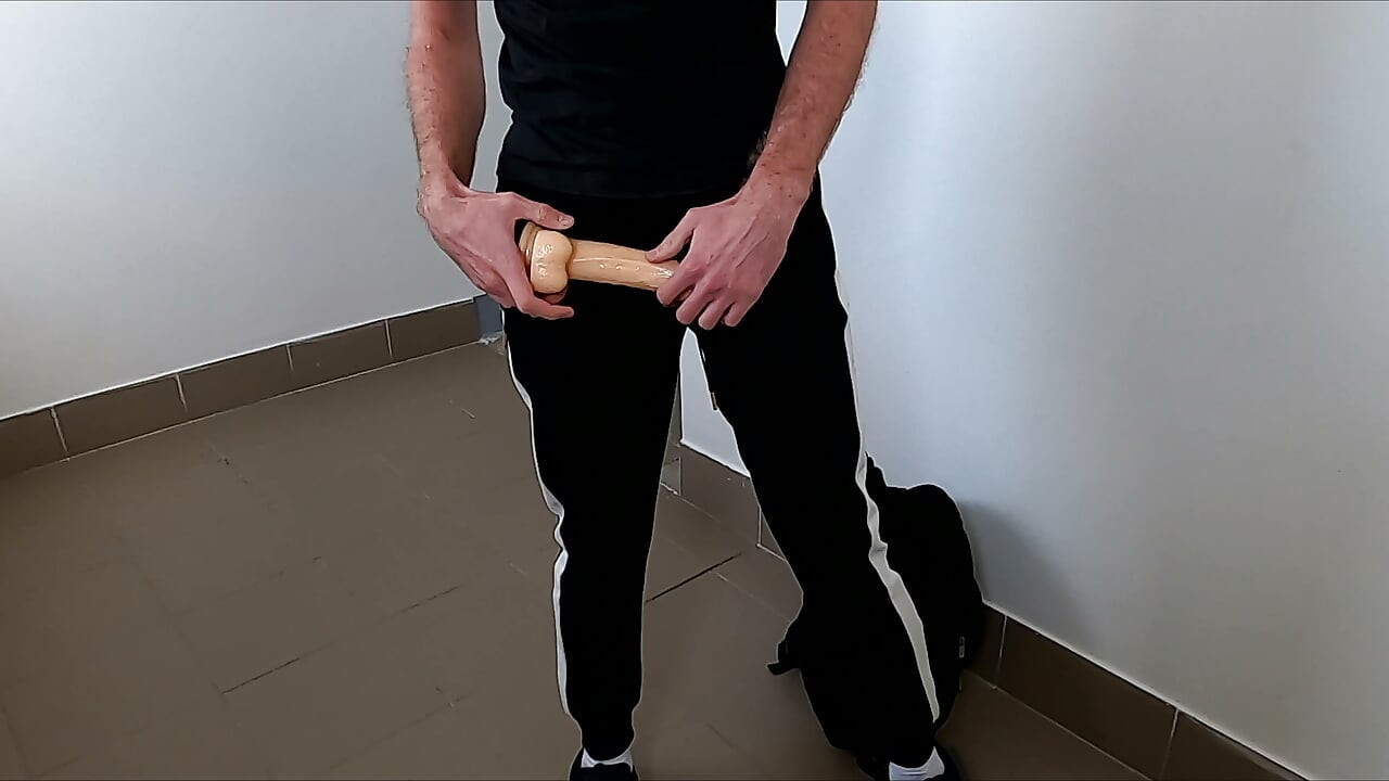 A Guy Fucked Himself in the Entryway with a Rubber Dildo
