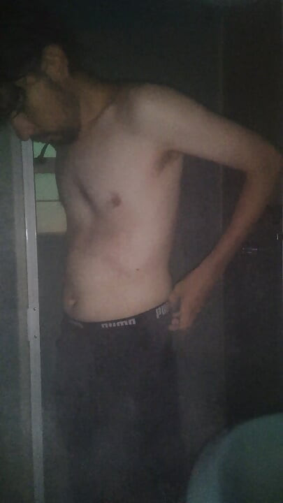 Man Showering with Flashlight On