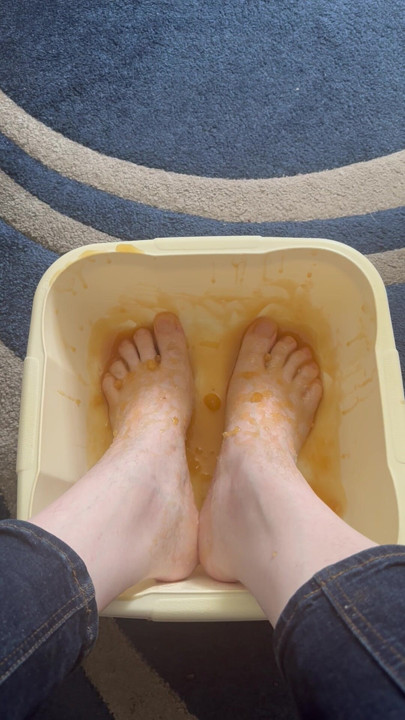 Kinky and Horny UK slut bathes feet in honey