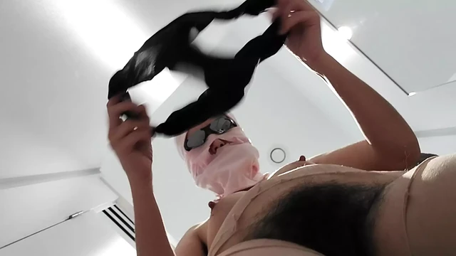 Horny mom undresses and masturbates with moans. Naughty sexy milf tries on naked clothes.