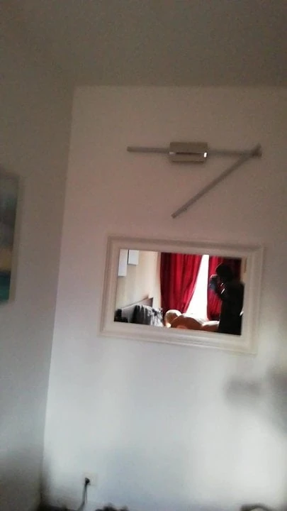 Me with a MILF at the hotel doggystyle in front of a mirror