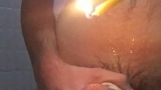 Juego de ducha anal con cera caliente y sonido y polla atada