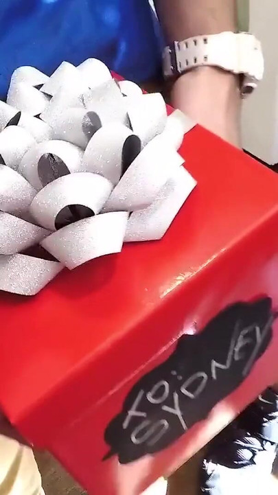 Emotional moment from "BFFS - Two Cute Girls Sydney Cole And Moriah Tyler Receive Naughty Gifts In Boxes From Kinky Dudes"