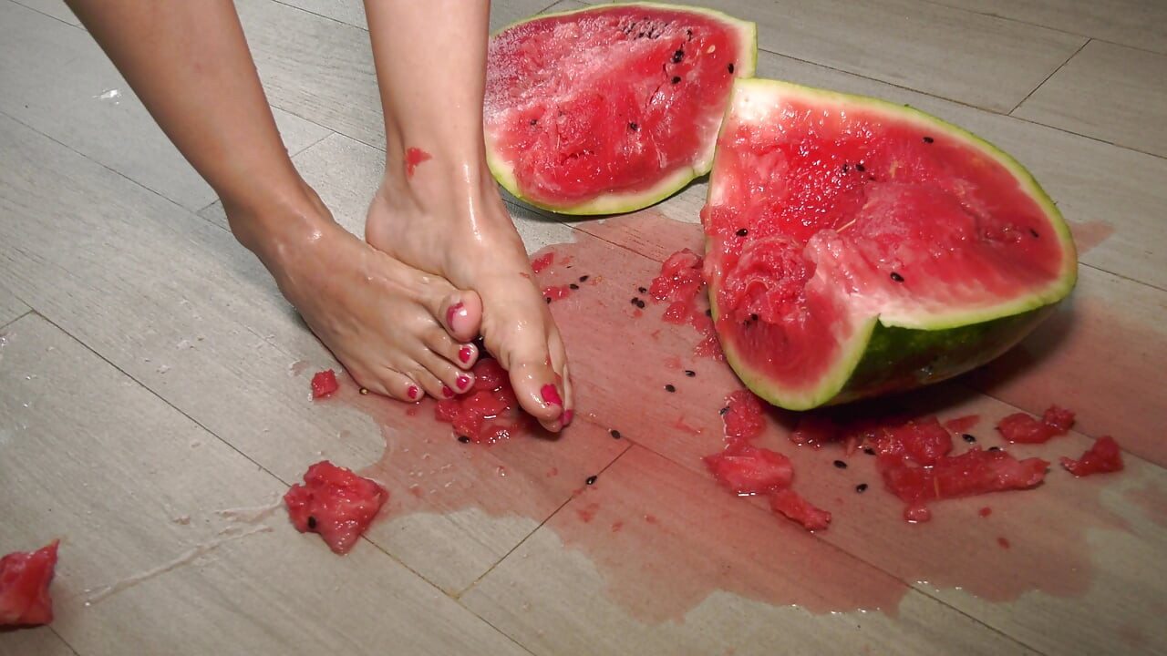 Busty MILF Presents Her Feet and Plays with a Watermelon