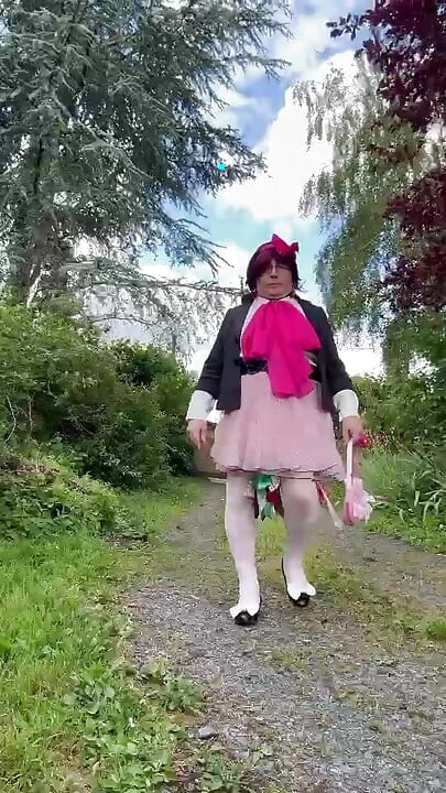 Dressed in a pink polka dot skirt for a party