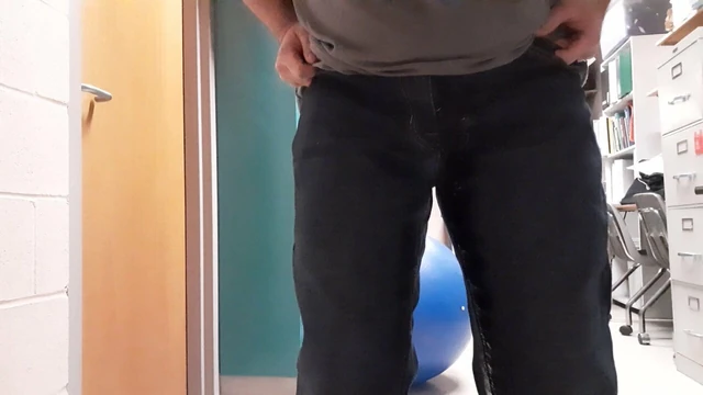 guy pees himself while waiting for bathroom at work