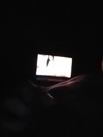 Stroking cock while watchin porn