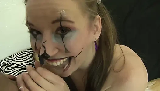 Clown girl gets a massive facial cumshot after being fucked hard