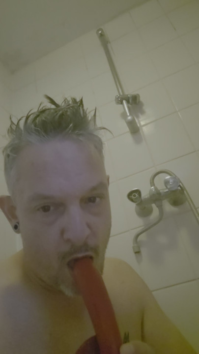 Dildo blowjob in the bathroom