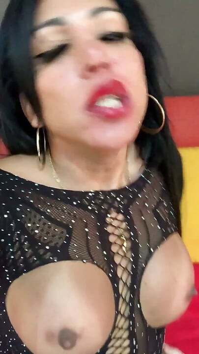 Aylla Shows off All Her Power Wearing a Sexy Outfit and Crystal Heels While Her Cock Is Rock Hard