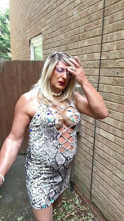 Sexy Crossdresser kellycd2022 in white animal print dress pantyhose and heels