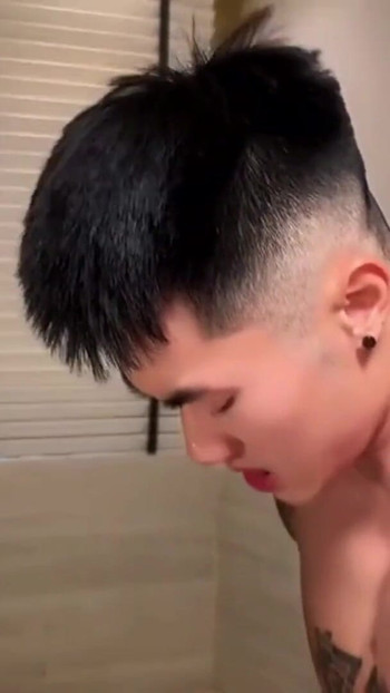 Emotional moment from "Tattooed Asian Twinks Fuck Hard at Home - Passion, Deep Thrusts & Double Cumshots"