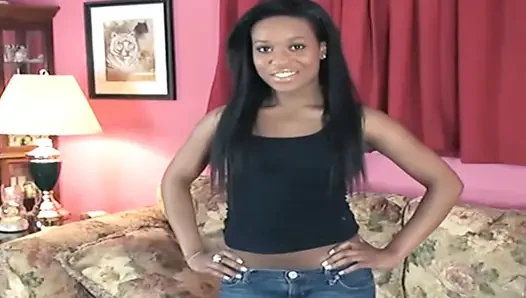 Seductive Ebony Babe Strips Naked on Couch Teasing Pussy