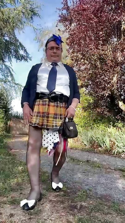 Dressed in a little yellow plaid skirt for a night out