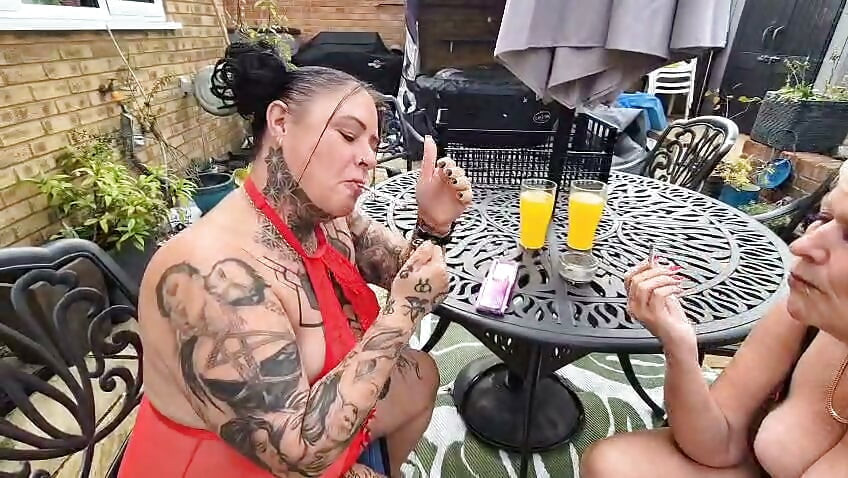 Joolz and Cheyenne Rose smoking in the garden