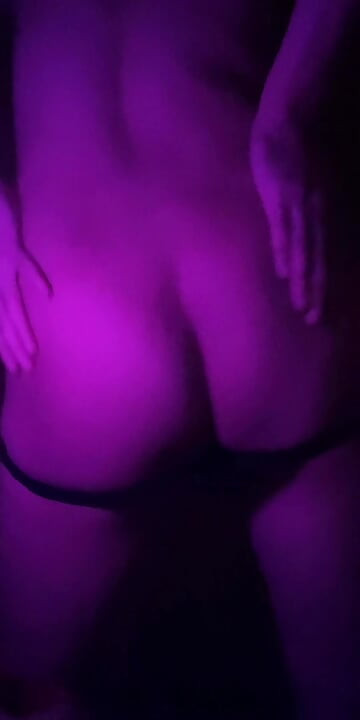 Dancing very provocatively in a thong