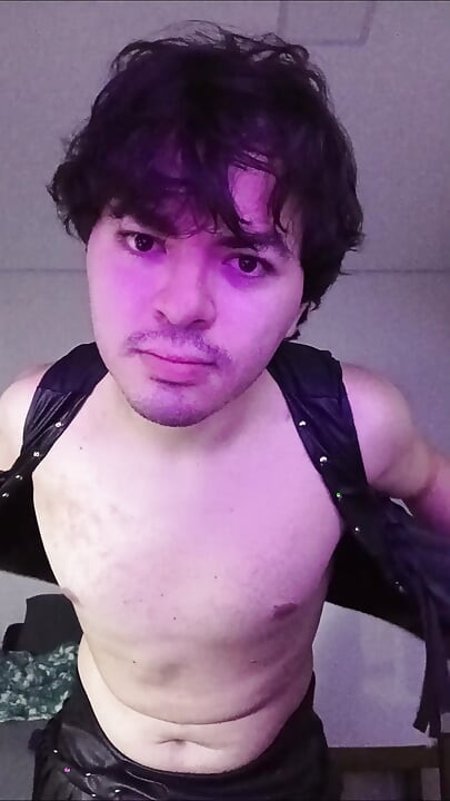 mean gay princess wearing cowboy latex leather skirt