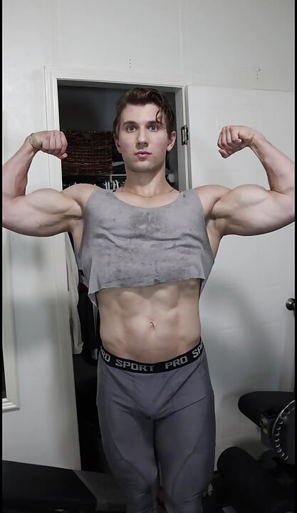 Adonis Beautiful Bodybuilder Boy Poses and Tries to Get You Workout