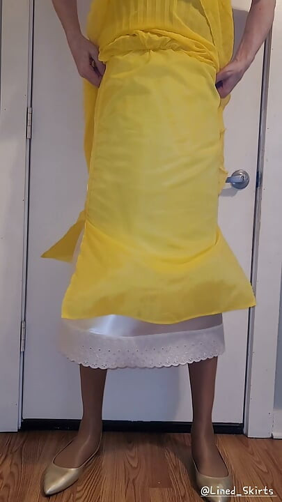 Yellow chiffon skirt with a satin half slip