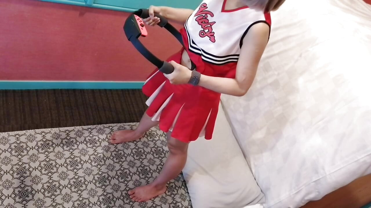 A cute, busty married woman does exercise 3 in a sexy cheerleader costume. Peeking down from above. Home made amateur Private Shoot