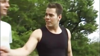 Gay couple doing anal sex in the nature