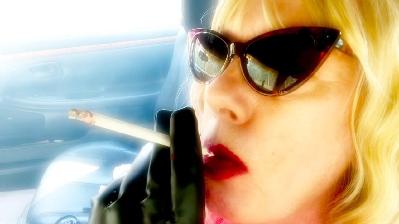MATURE BLONDE SMOKING VS120 MENTHOLS WITH CAT SUNGLASSES