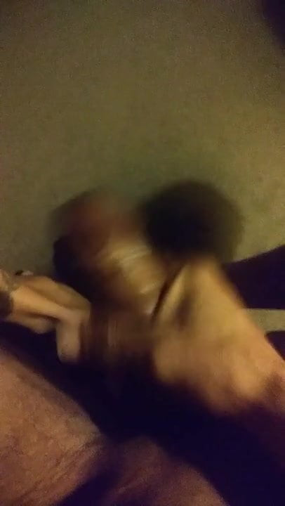 Masturbating