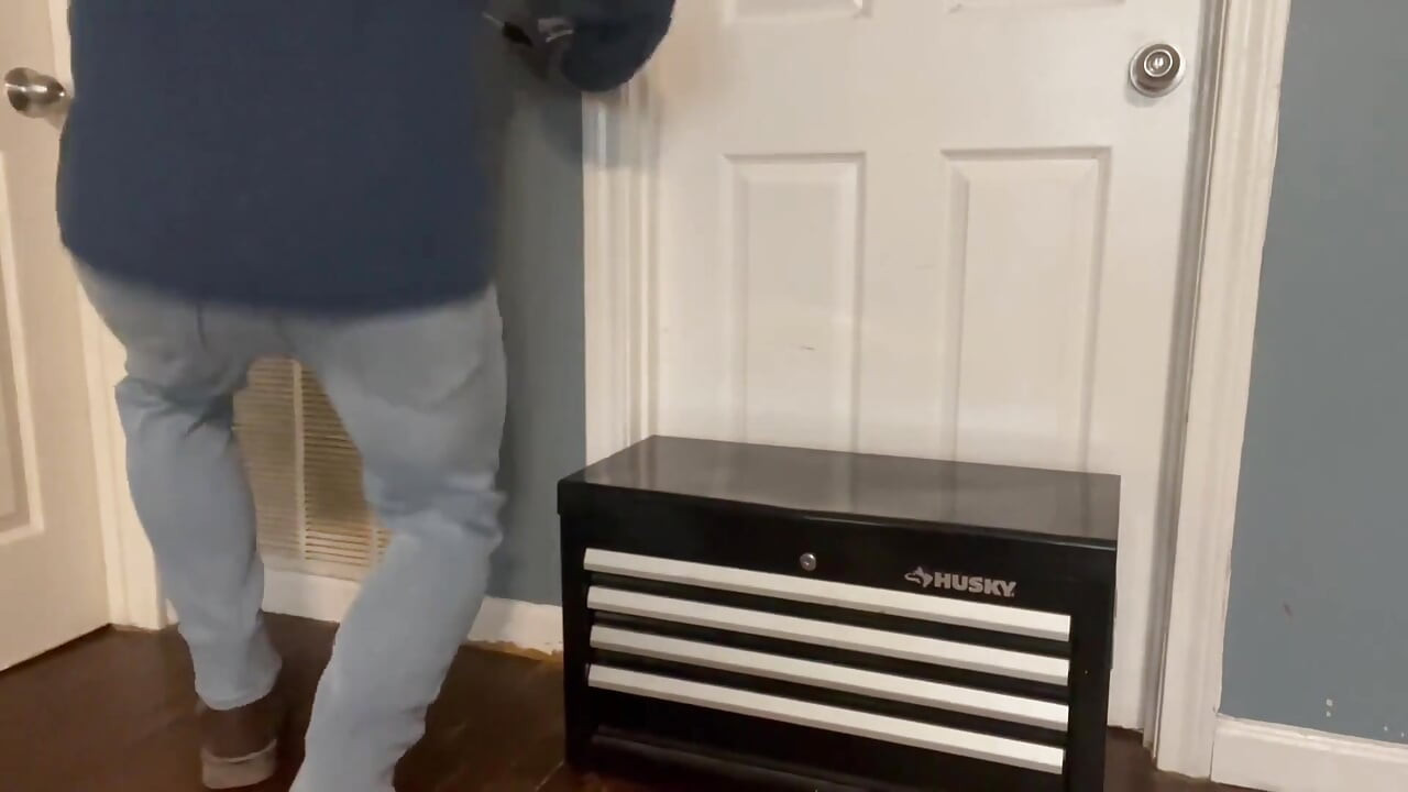 Repairman Gets Distracted by Toy in His Toolbox