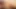 Tanned ladyboy with small tits strips her red panties and