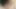 A brunette on her knees is giving an amazing blowjob for his small dick