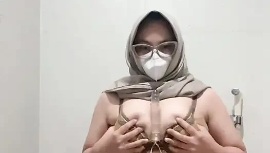 Brutal busty girl in bikini masturbates using squirt tipped dildo