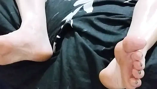Massaging my feet and legs with oil