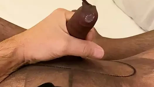 Crossdresser cumming in sheer nylons