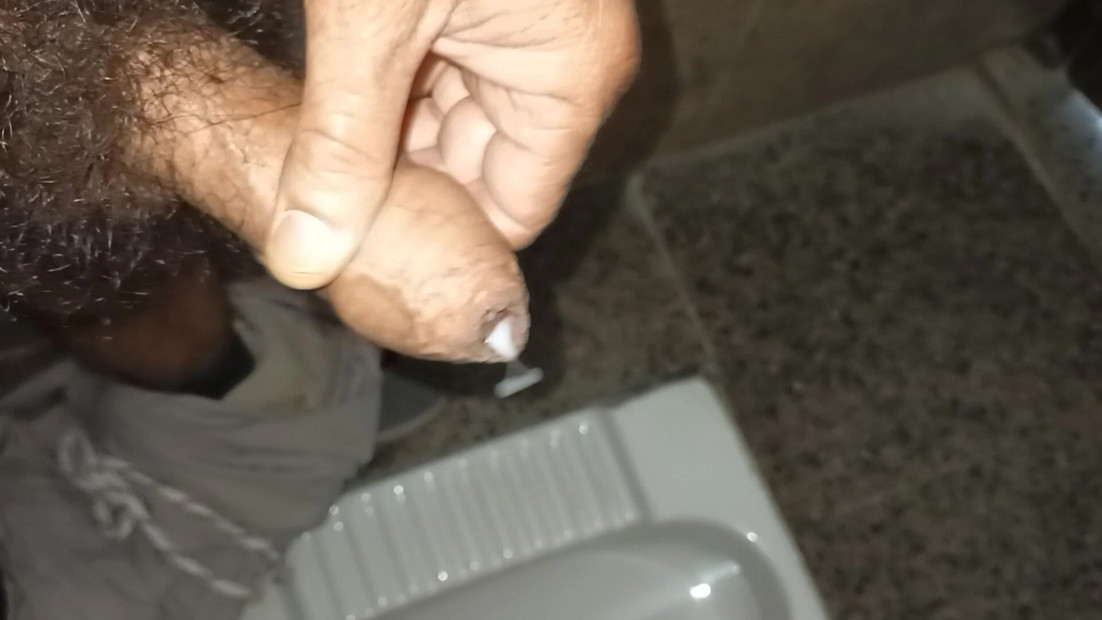 Indian man masterbation in the toilet