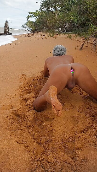 Naked ladysilva on the beach showing off her tanned hot ass with butt plug in her ass