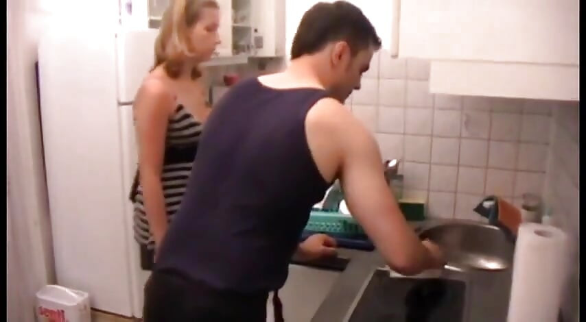 Poor Dude Must Clean Kitchen on Order of His Mistress