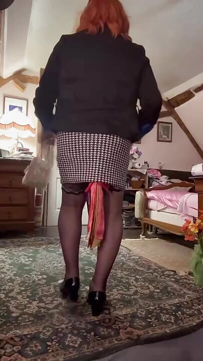 Dressed in a secretary-style skirt for an evening