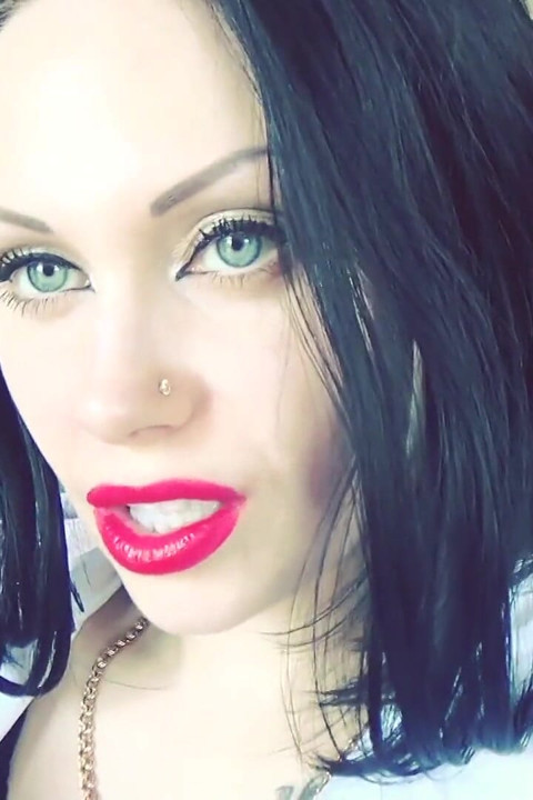 Luscious red lips tease