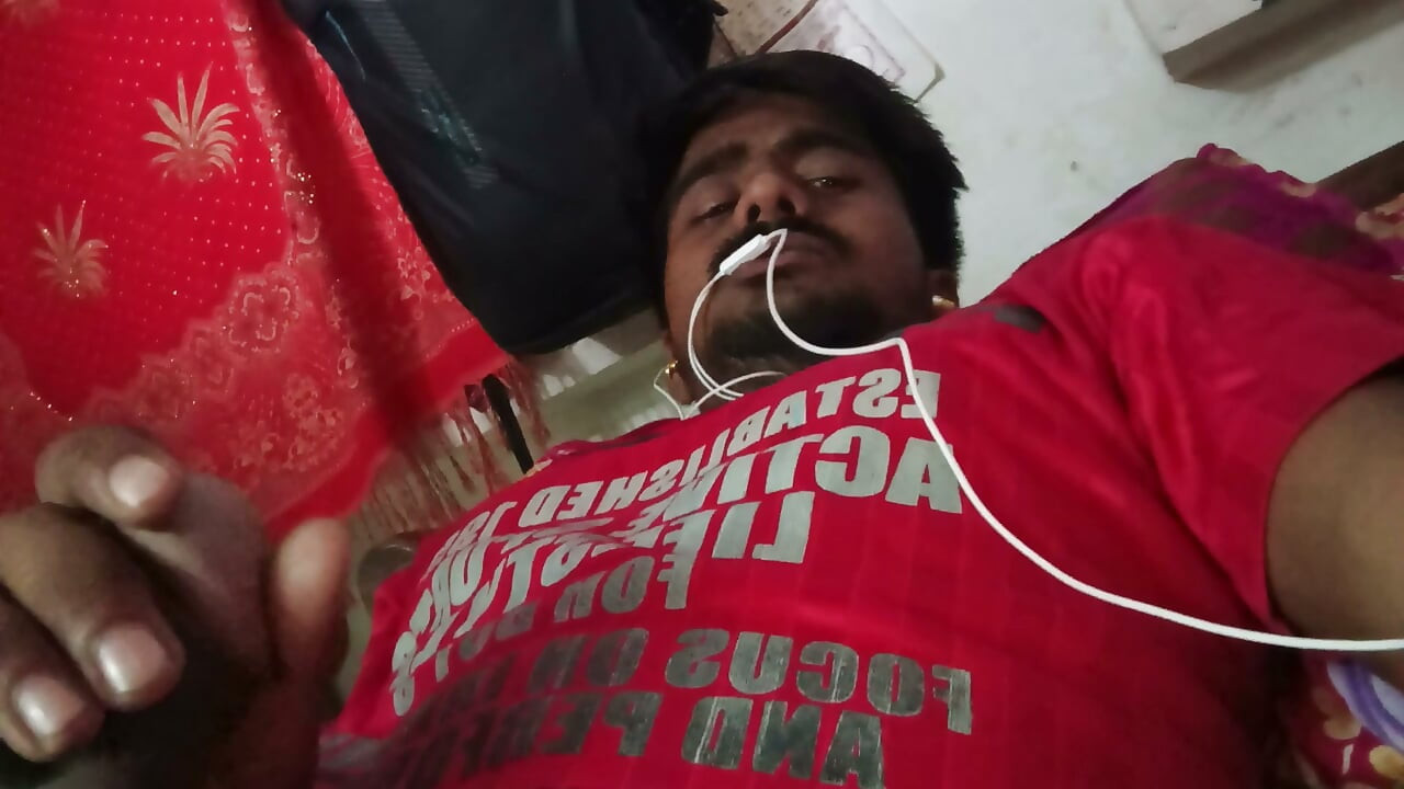 the handsome man in the red t-shirt