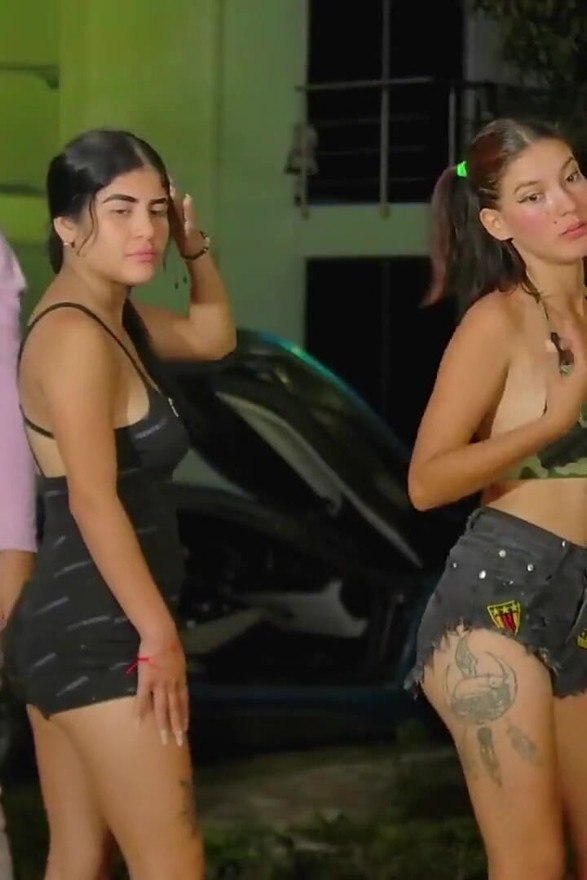 latinas spit on the boobs of one of her friends